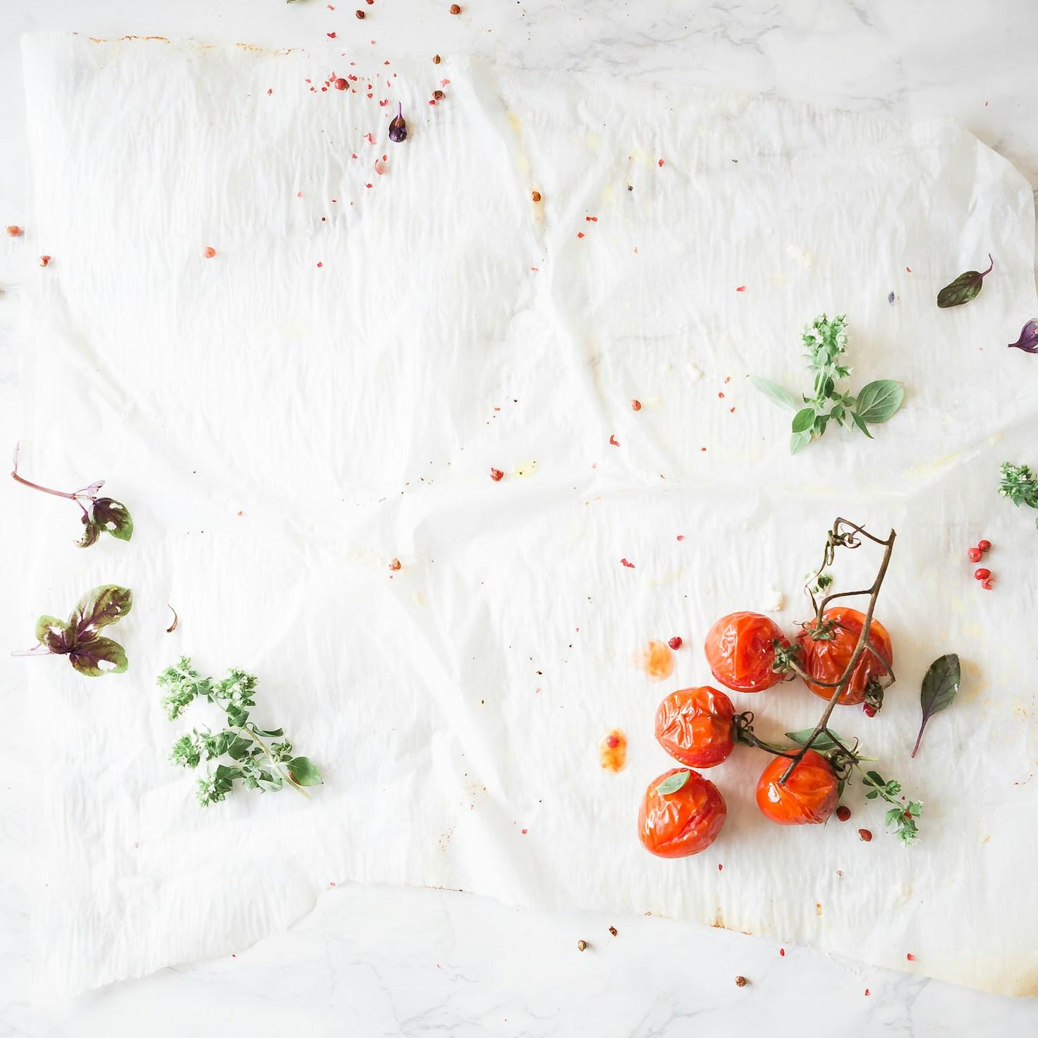 Community members collaborating in a modern kitchen space, sharing recipes and cooking techniques